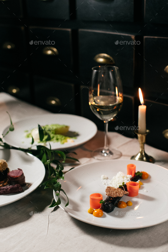 Delicious cooked vegetables. Dill snow. Michelin star food on gourmet French restaurant - Stock Photo - Images
