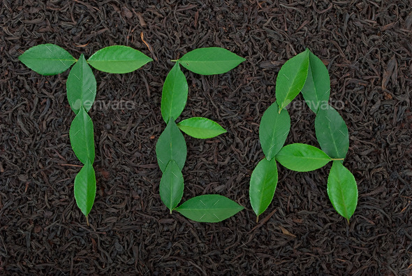 Black tea with leafs - Stock Photo - Images
