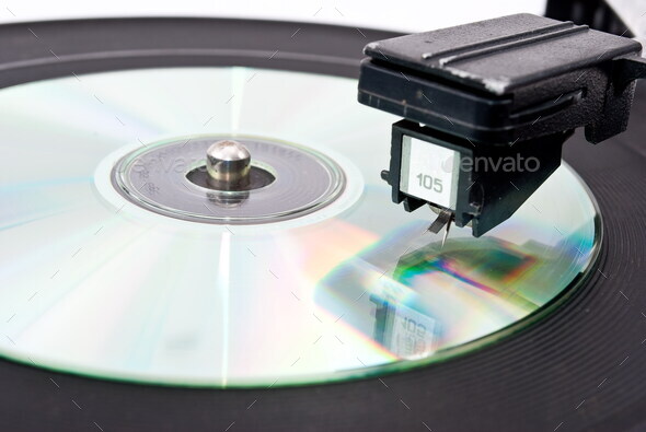 Vinyl player and compact disk - Stock Photo - Images