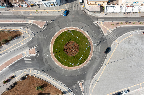 Aerial drone view of a traffic roundabout main road junction of Nafplio  town Peloponnese Greece. Stock Photo by rawf8