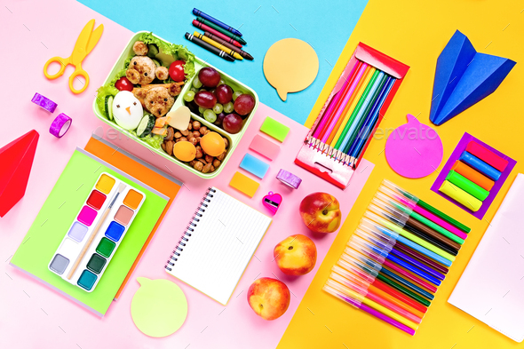 Back to school flat lay with supplies and lunchbox - Stock Photo - Images