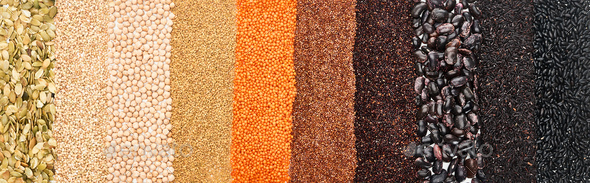 panoramic shot of assorted black beans, rice, quinoa, red lentil, buckwheat, chickpea and pumpkin