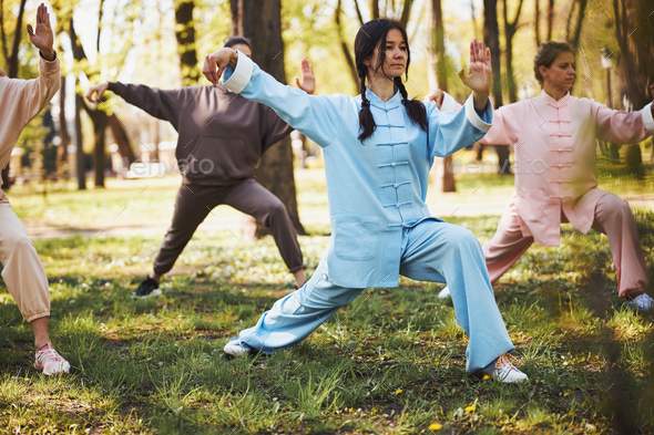 Taijiquan master introducing a new move for her students
