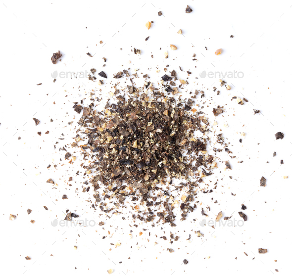 ground black pepper flakes isolated on white background Stock Photo by