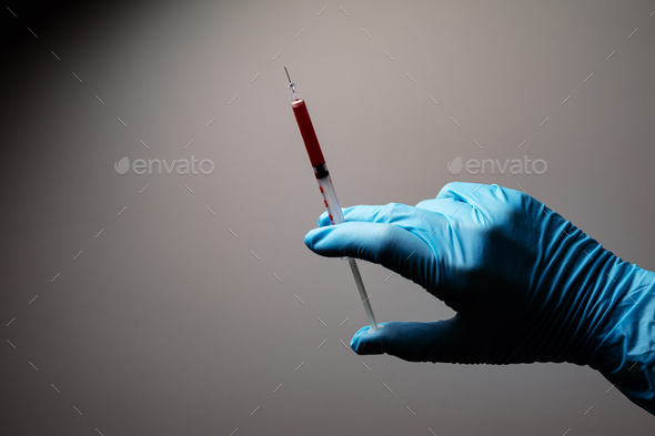 Doctor's hand with blood probe. Coronavirus test - Stock Photo - Images