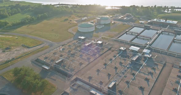 Top Aerial View of Purification Tanks of Modern Wastewater Treatment Processing Plant alt