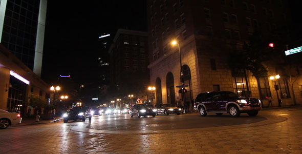 Cars Driving Down City Street 3