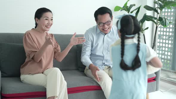 family are happy cute affectionate adopted little kid girl hugging foster care parent mother alt