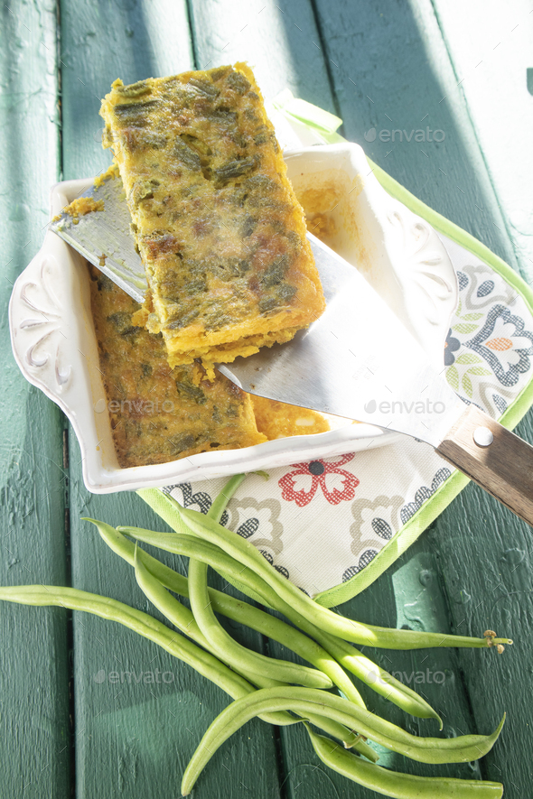 Vegan cooking savory pie with chickpea flour and green beans