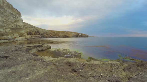 Amazing Day to Night Timelapse of Beautiful Seascape, Stony Shore, Clear Water alt