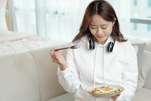 Pretty Woman Eating Breakfast