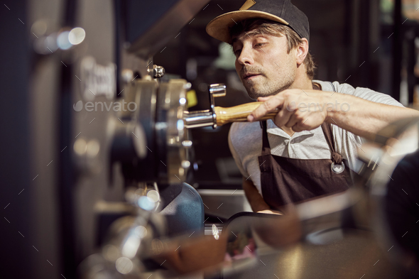 Professional industrial coffee machine in a bar Stock Photo by