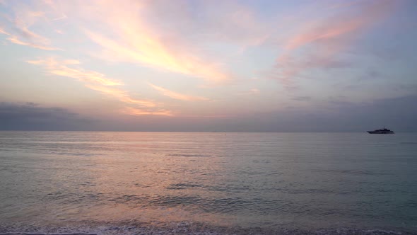 Summer Vacation with Romantic View on Sunset Sky Over Sea with Birds Flying with Ship Seascape