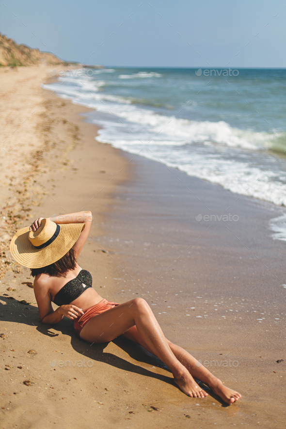 Beautiful women enjoying vacation on the beach