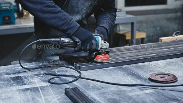 Better quality, better speed. Mechanic steel. Grinding - Stock Photo - Images