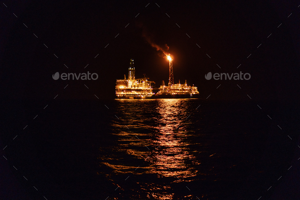 Night view of FPSO tanker vessel near Oil Rig Stock Photo by Igor_Kardasov