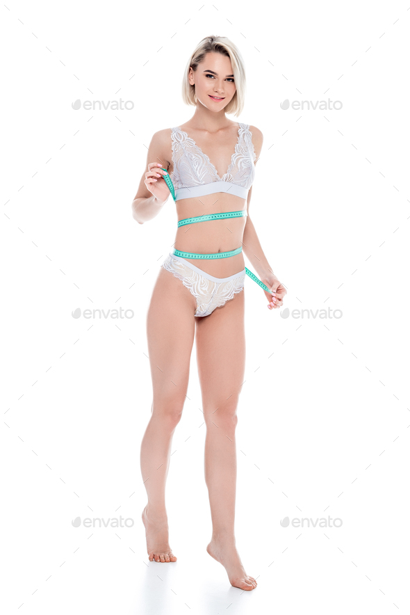 Slim girl with perfect body in full body isolated over white