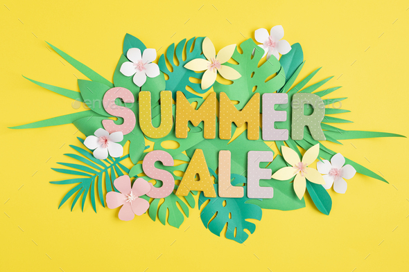 Word Sale over tropical paper cut leaves background. Summer sale, online  deals, discounts idea Stock Photo by OksaLy