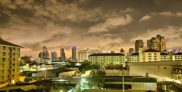 Fast Clouds Above Bangkok City Skyline At Night
