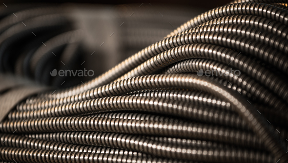 Huge golden bundle of metal flexible shield - Stock Photo - Images