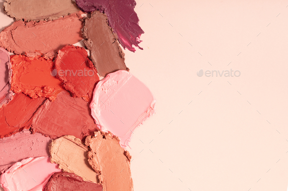 Various lipstick smudged. Mat lipstick texture background