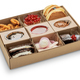 Assortment of confectionery products with berries to a container for home delivery on request - PhotoDune Item for Sale