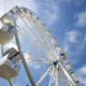 Ferris wheel of white color in blue sky - PhotoDune Item for Sale