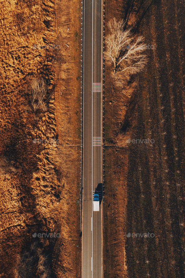 Mini truck on the road from above