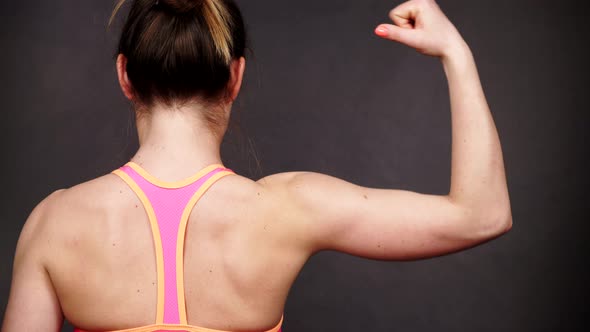 Girl Shows Muscles of Back and Shoulders, Stock Footage