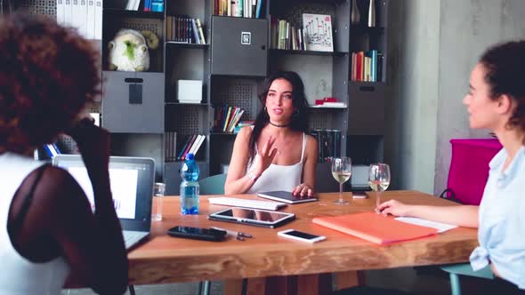 4k ultra hd three young multiethnic women brainstorming alt