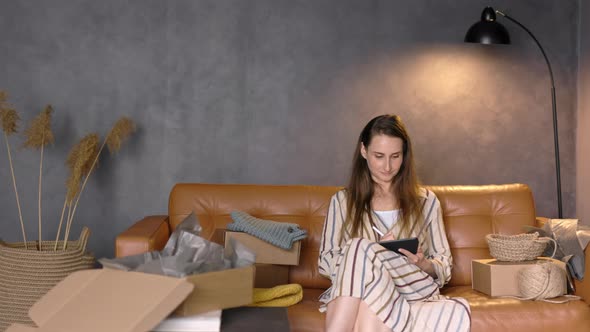 Business Woman Working from Home, Handcrafting Business Homemade, Preparing Boxes for Clients, Copy alt