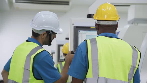 Group of diversity worker people wearing protective safety helmet and glasses in industry factory. alt