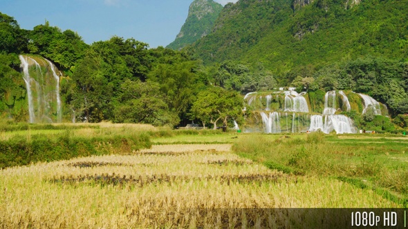 Ban Gioc Waterfall in Rural Landscape with Mountains alt