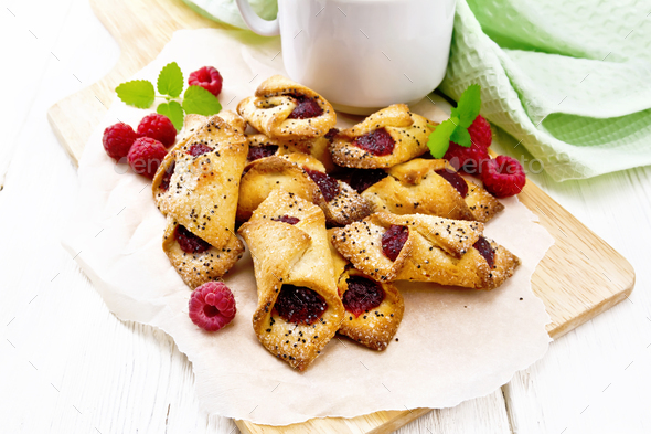 Cookies with raspberries on board - Stock Photo - Images