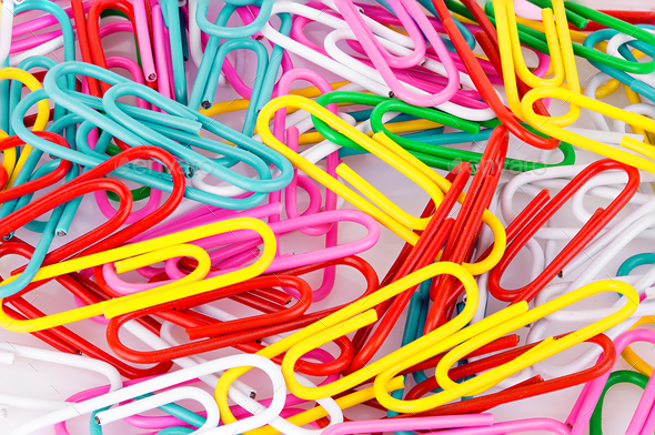 Stationery paper clips, multicolored close-up as a background. Stationery concept. - Stock Photo - Images