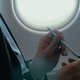 Businessman using smart phone during the flight - PhotoDune Item for Sale