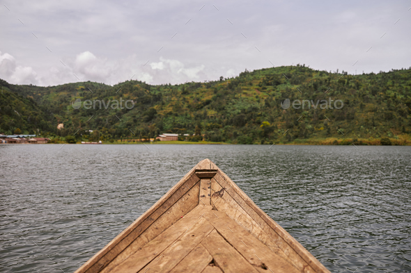 Tropical landscape with woods and lake in east african country