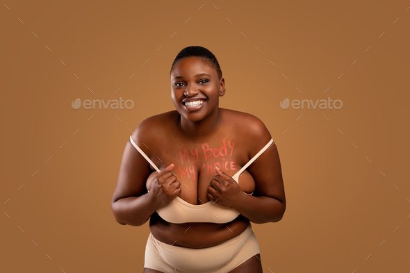 Portrait Of Curvy Smiling Black Woman In Underwear Posing