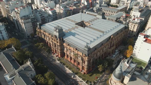 Aerial pan left flying over the Palace of Running Waters, a National Historical Monument of Buenos A alt