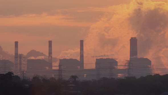Beautiful Landscape in the morning time with fog and background Mae moh coal power plant. alt
