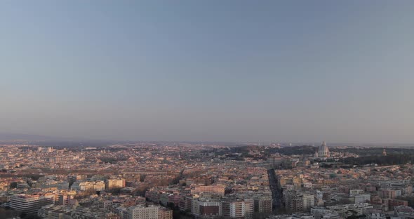 Wide pan of Rome at sunset With Vatican city
