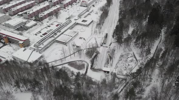Trolley Tram Stop in Urban Area in Winter Transport Transit Top Down Aerial alt