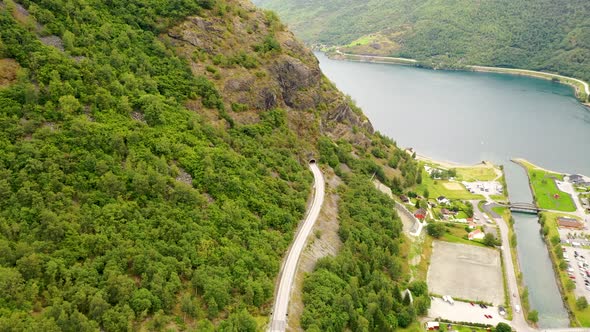 Road entering a Tunnel on a mountain alt
