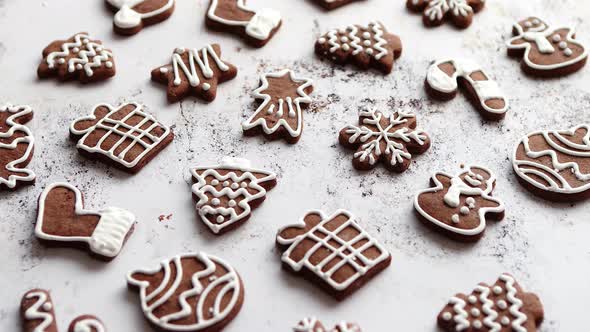 Composition of Delicious Gingerbread Cookies Shaped in Various Christmas Symbols alt