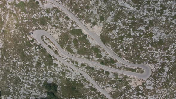 Top View of a Dangerous Alpine Road That Develops on a Mountain Slope in Biokovo Park