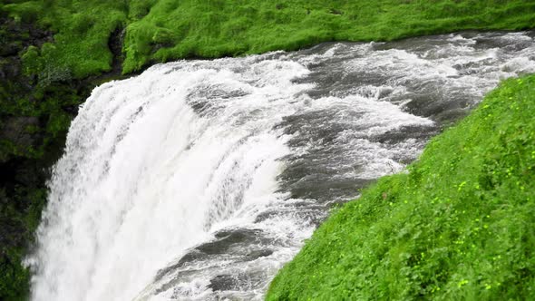 Skogafoss Waterfalls and Mountains in Summer Season Iceland alt