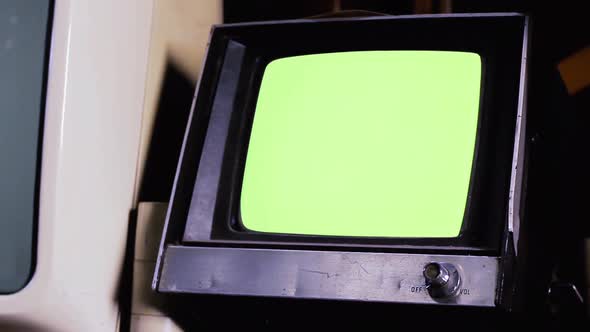 Vintage Portable TV Set with Green Screen. alt
