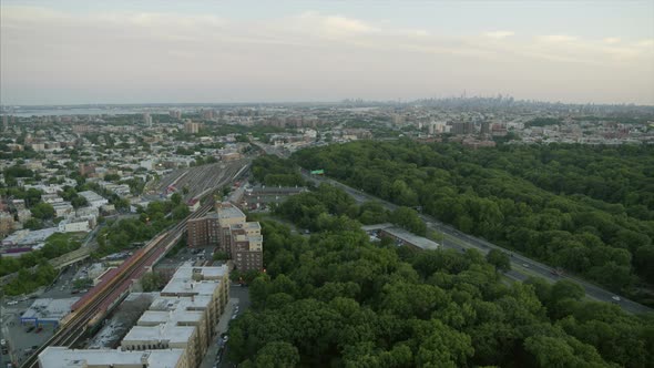 Aerial Pan Shot of Bronx River Parkway and NYC Skyline alt
