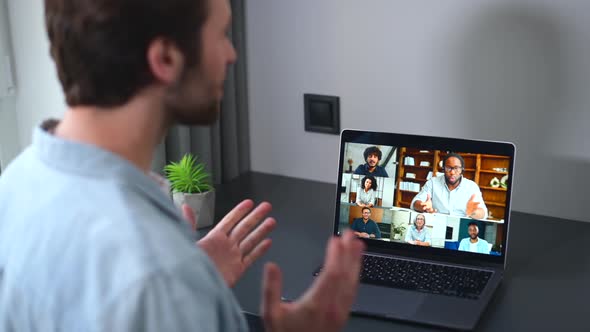 Caucasian Freelancer Man Waving Hello Into Laptop Webcam Guy Connected Via Video with Colleagues