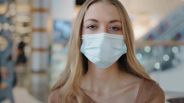 Portrait Caucasian 30s Millennial Girl Blond Woman Businesswoman in Medical Protective Face Mask alt